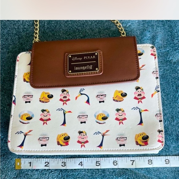 Loungefly Disney Pixar Character Pattern Wallet - Brown and White - Picture 2 of 5